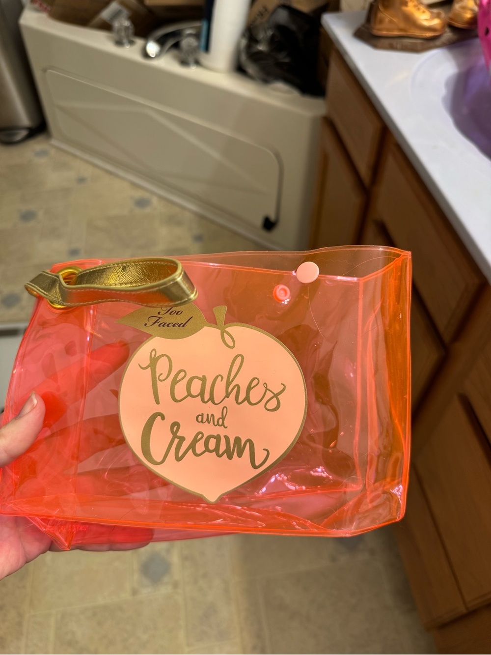 Too Faced Peaches and Cream Orange Clear Travel Pouch